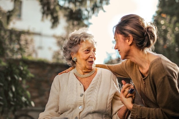 senior caregiver loving her job